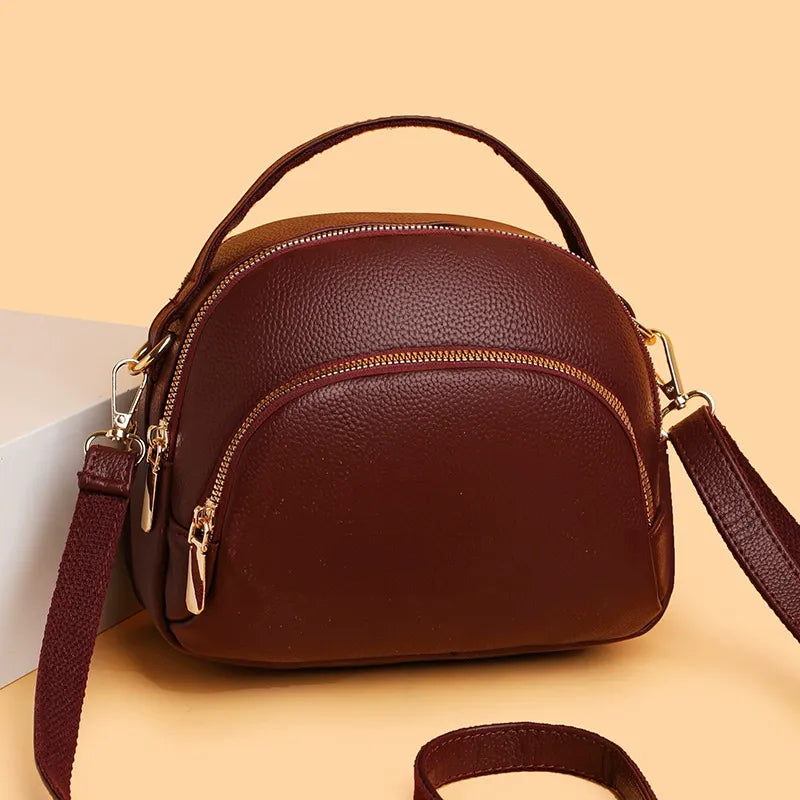 Проста и многофункционална дамска чанта през рамо